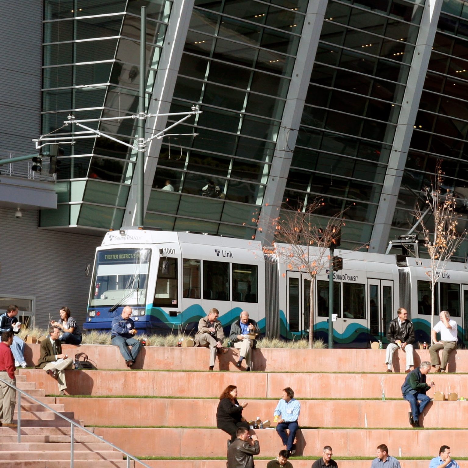 Light Rail Train Station with People and Train